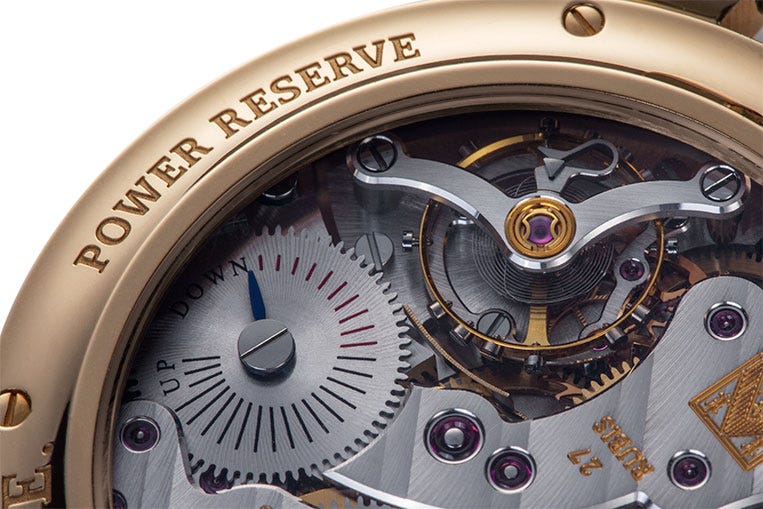 The power reserve is located on the back to keep the dial clean